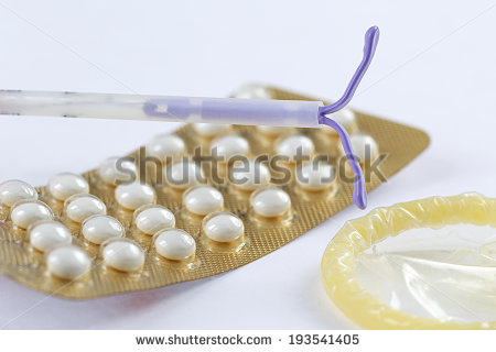 stock-photo-birth-control-symbol-iud-and-contraceptive-pills-and-condom-193541405